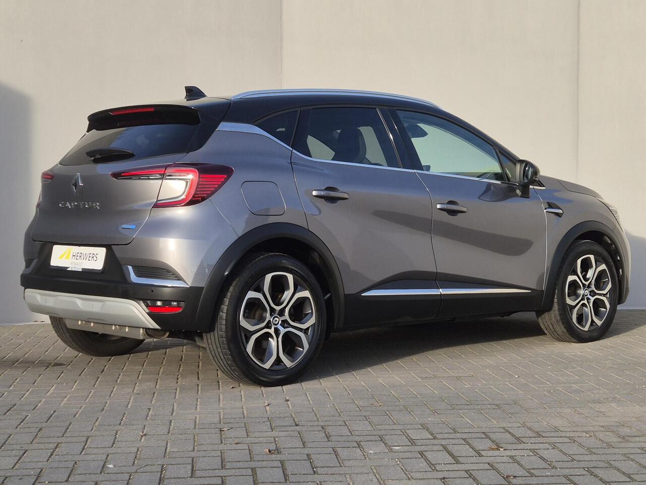Renault CAPTUR 1.6 E-Tech Plug-in Hybrid 160 Intens Automaat / Pack parking / Stuur en Stoel verwarming / Apple Carplay Android Auto / Achteruitrijcamera / Keyless Entry/Start / Draadloze telefoon lader / Cruise control / Navigatie /