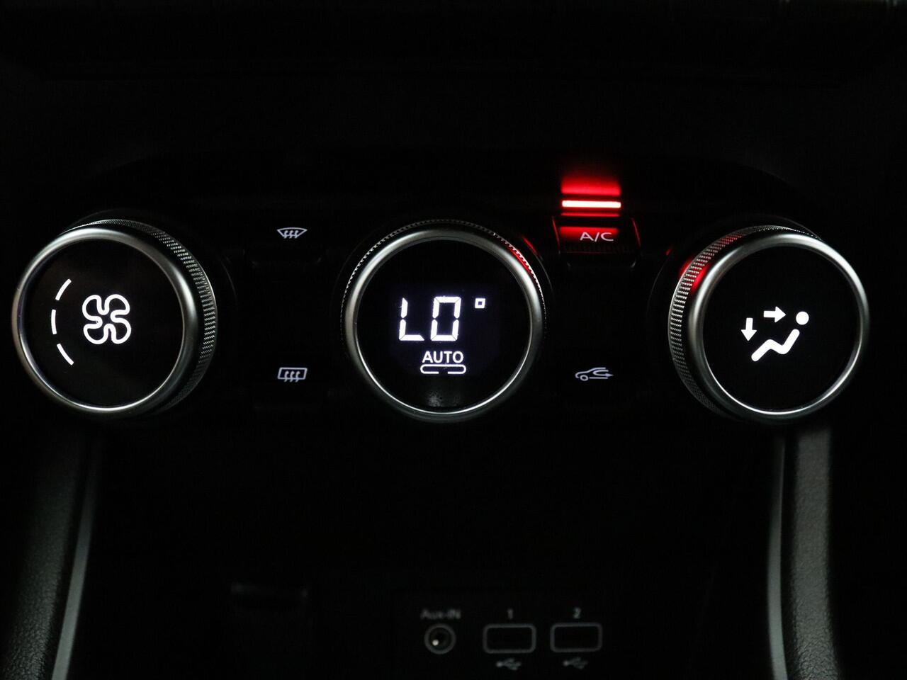 Renault CAPTUR 145pk E-Tech Hybrid Intens Cruise | Climate | Carplay | Navi | Parkeersens. achter