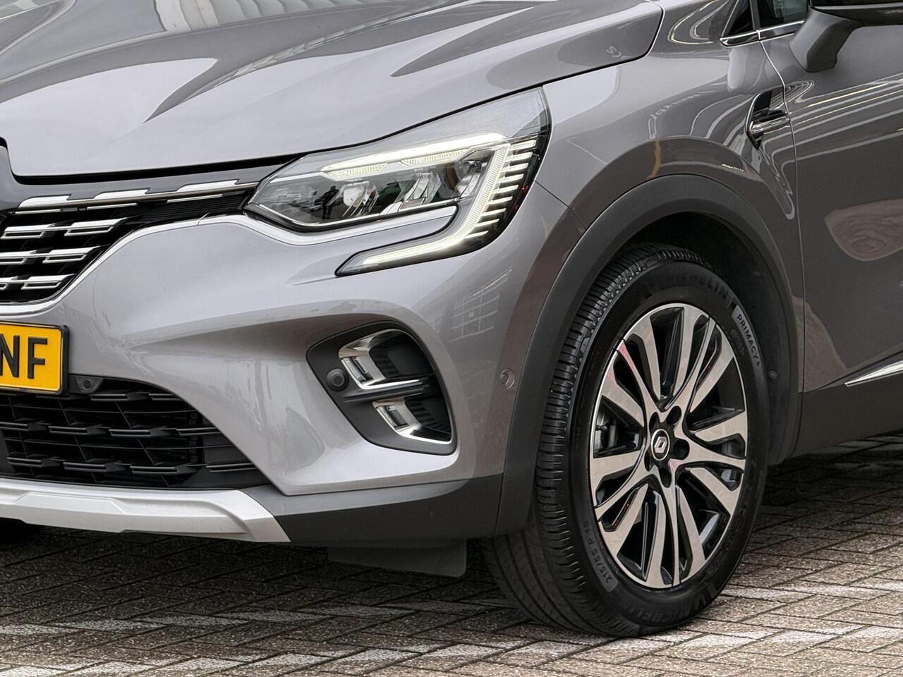 Renault CAPTUR 1.6 E-Tech Plug-in Hybrid 160 Initiale Paris | Glazen schuif-kantel dak | Leer | Stoel & stuur verwarming | 360 graden camera | DAB | Park assist | Climate Control |