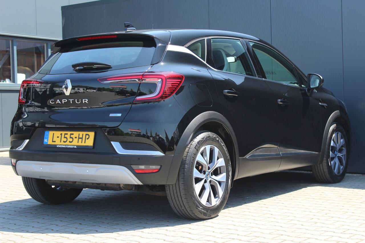 Renault CAPTUR 1.6 E-Tech Plug-in Hybrid 160 Intens | Incl. 12 maanden garantie | Achteruitrijcamera | Trekhaak | Bluetooth | Voorstoelen verwarmd | Parkeersensoren voor en achter | DAB | Lichtmetalen velgen | Navigatie | Climate control | Stuurwiel verwarmd