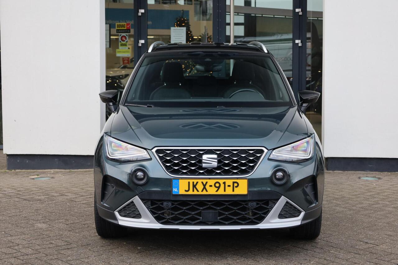 Seat Arona 1.0 TSI Xperience 18" LMV achteruitrijcamera Full LED verlichting full map navigatie ACC adaptieve cruise control parkeersensoren voor en achter zwart dak chrome dakrail en sierlijsten climatronic spiegel pakket vario vloer draadloos carplay navigatie led