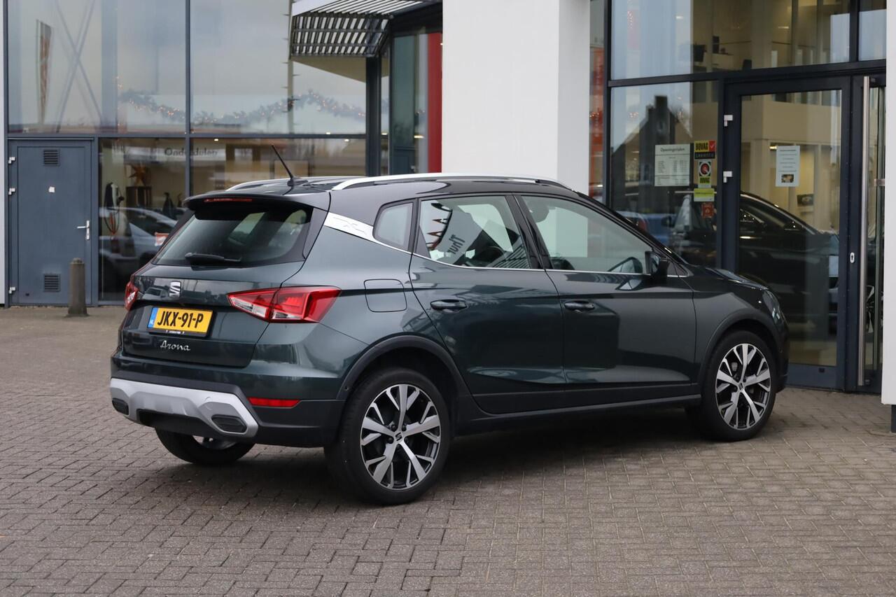 Seat Arona 1.0 TSI Xperience 18" LMV achteruitrijcamera Full LED verlichting full map navigatie ACC adaptieve cruise control parkeersensoren voor en achter zwart dak chrome dakrail en sierlijsten climatronic spiegel pakket vario vloer draadloos carplay navigatie led