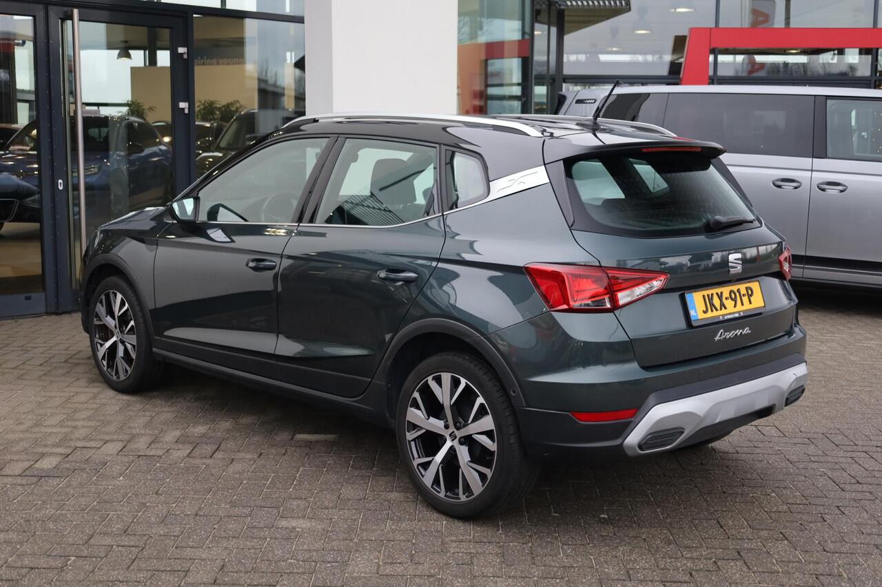 Seat Arona 1.0 TSI Xperience 18" LMV achteruitrijcamera Full LED verlichting full map navigatie ACC adaptieve cruise control parkeersensoren voor en achter zwart dak chrome dakrail en sierlijsten climatronic spiegel pakket vario vloer draadloos carplay navigatie led