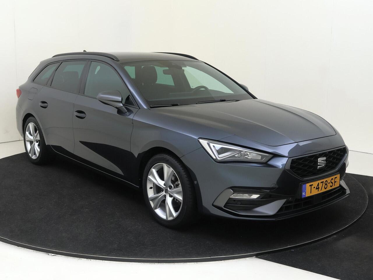 Seat LEON Sportstourer 1.0 eTSI FR Business Intense | Trekhaak | Parkeerassistent | 3-zone airco | Adaptieve cruise control | Achteruitrijcamera | Dodehoek detectie |