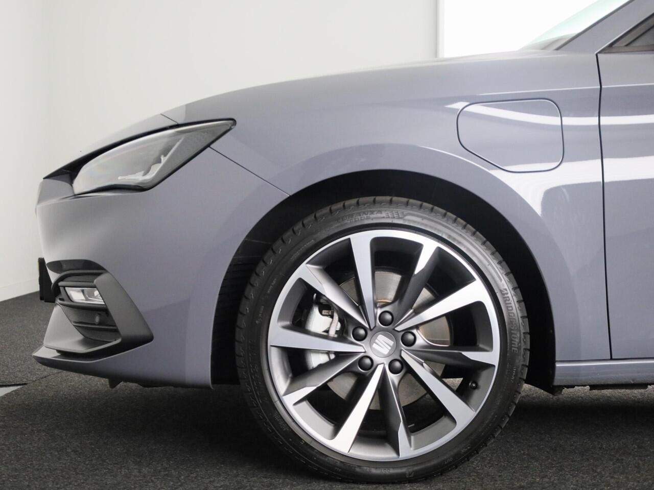Seat LEON Sportstourer 1.5 TSI e-Hybrid FR PHEV First Edition 204 pk Automaat | Verlengde garantie | Navigatie | Parkeersensoren | Achteruitrijcamera | Adaptieve cruise control |