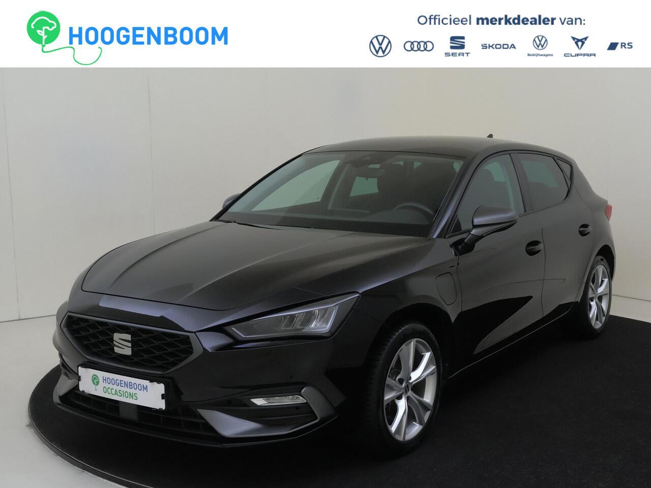 Seat LEON 1.4 TSI eHybrid PHEV FR | Stoel- en stuurwielverwarming | Navigatie | Sfeerverlichting | 3-zone airco | Cruise control | Elektrisch inklapbare buitenspiegels | Draadloze telefoonlader |