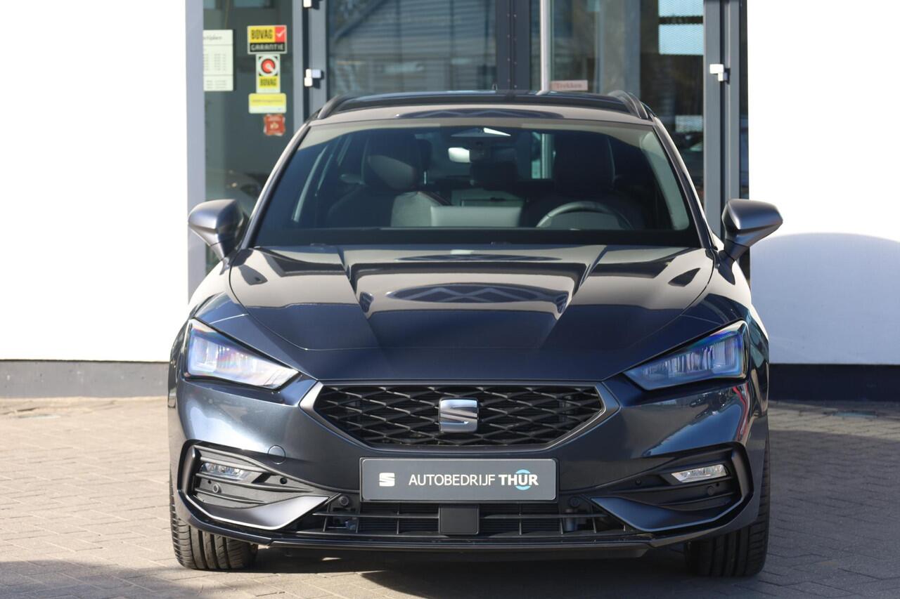 Seat LEON Sportstourer 1.5 TSI e-Hybrid FR Business 150KW/204PK DSG, uit voorraad leverbaar! 17 INCH Dynamic velgen, sportstoelen voor, zwarte dakhemel, dodehoek sensor, buitenspiegels elektrisch inklapbaar, slimme led, uitstap waarschuwing.