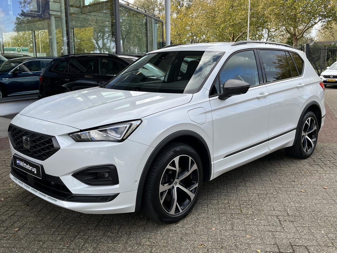 Seat Tarraco 1.4 TSI e-Hybrid PHEV FR Business Intense / Zwenkbare trekhaak / achteruitrij camera / 19'' LMV / 3-zone climate / stoelverwarming voor en achter
