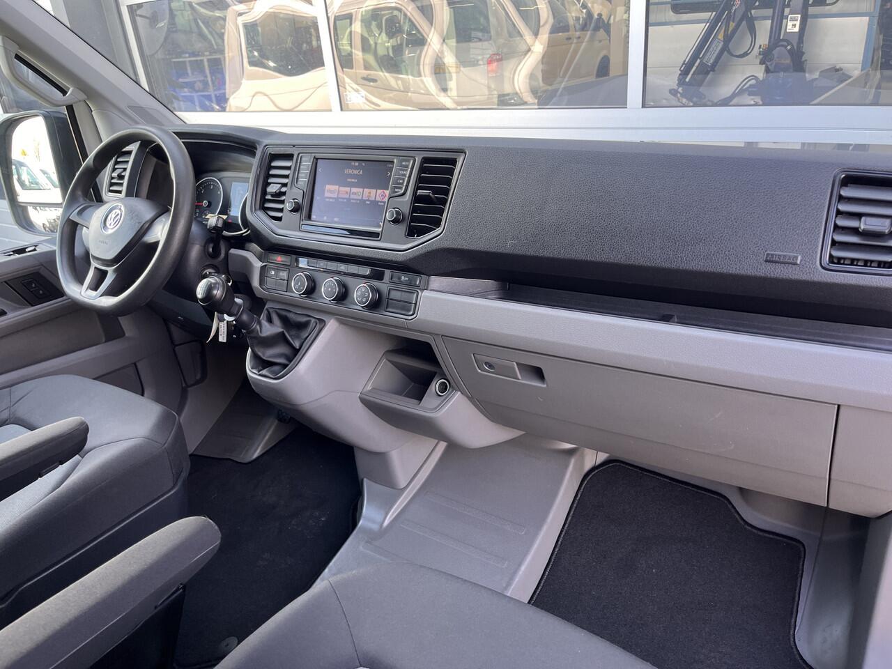 Volkswagen CRAFTER 35 2.0 TDI L3H3 oud L2H2 140pk Airco Cruise control Trekhaak 3000kg Kastinrichting Omvormer Standkachel werkplaats Navigatiesysteem Telefoonverbinding 2-Persoons Camera Euro 6