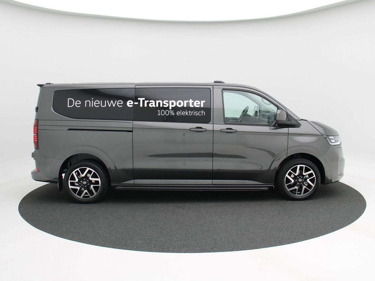 Volkswagen E-Transporter Style Intro L2 286 pk | 19" LM | Side Bar | Trekhaak | Camera | Stoelverwarming | Voorruit Verwarming | Carplay | Dodehoek Detectie | Schuifdeur Rechts |