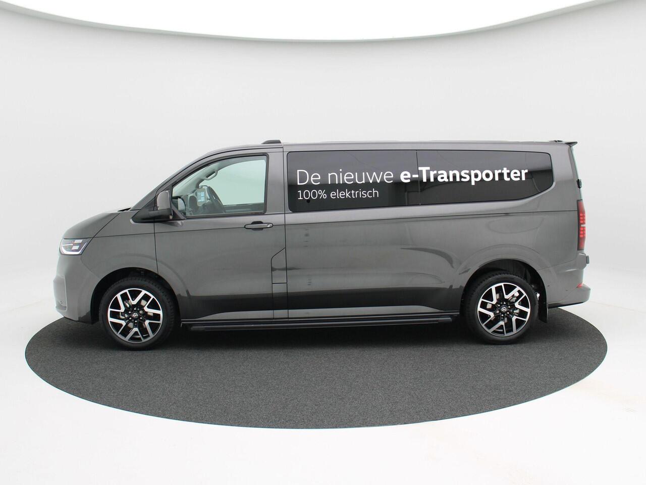 Volkswagen E-Transporter Bedrijfswagens Style Intro L2 286 pk | 19" LM | Side Bar | Trekhaak | Camera | Stoelverwarming | Voorruit Verwarming | Carplay | Dodehoek Detectie | Schuifdeur Rechts |