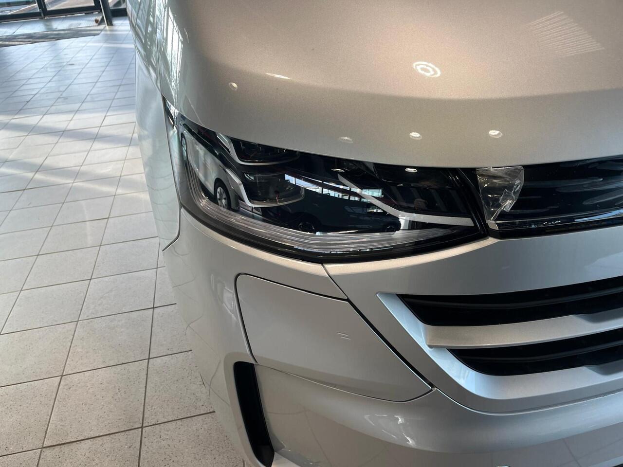 Volkswagen E-Transporter Bedrijfswagens Bulli L2 286pk 64kWh Elektrische aandrijving | Accu 95Ah (AGM) | Lichtmetalen velgen 17" (6,5 J 17) "Le Mans" (glanzend zwart) | Achterdeuren zonder ruit | Binnenspiegel met digitaal display en dashcamfunctie via app |