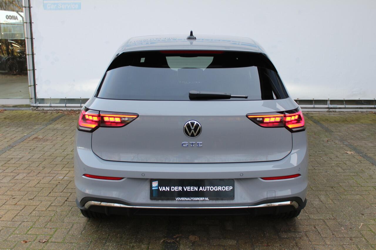 Volkswagen GOLF 1.5 eHybrid GTE 272 pk | Panorama dak | Stoel/Stuur verwarming | 360* Camera | Schuif/Kantel dak | Adaptive cruise controler | Keyless start | Apple CarPlay/Android Auto | Draadloze telefoonlader | IQ.Lights | Climate controle | Parkeersensoren V+A | Navi