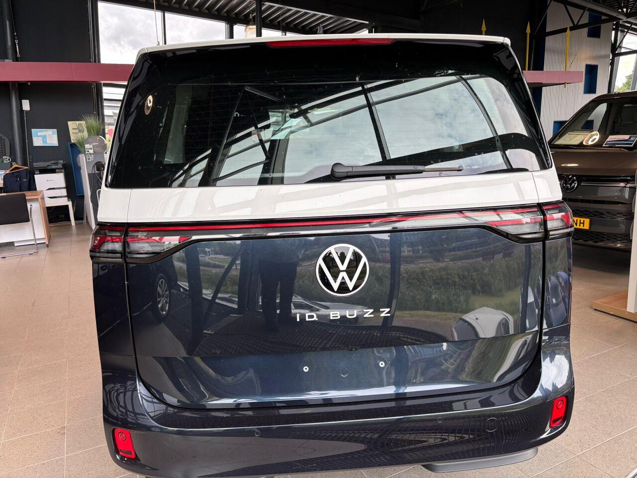 Volkswagen ID. Buzz Cargo Bedrijfswagens Anniversary Edition Elektromotor 210 kW (286 pk) | Anniversary Edition | Achterlichten LED, luxe uitgevoerd incl. dynamische knipperlichten | Hoge scheidingswand met vaste ruit en dimbare binnenspiegel | Bluetooth telefoonvoorbereiding incl