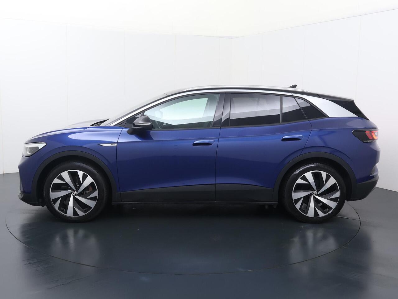 Volkswagen ID.4 First 77 kWh | 204 PK | SoH 87% | Navigatiesysteem | Adaptive cruise control | Verwarmde voorstoelen + voorruit | 20" LM velgen |