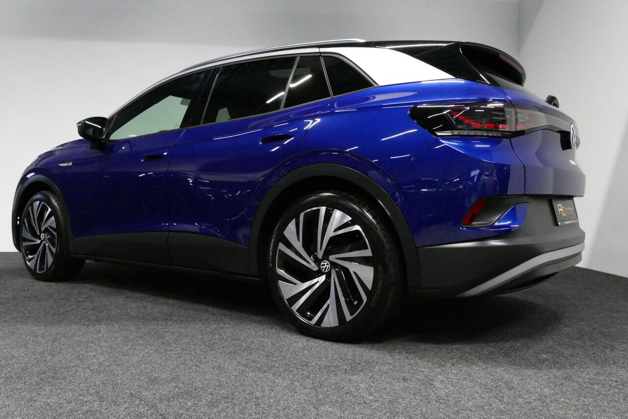 Volkswagen ID.4 First Max 77 kWh / SOH 92% / Panoramadak / Matrix LED IQ.Light / Elektr. verstelbare voorstoelen + memory / HUD Augmented Reality / Rondomzichtcamera / Apple Carplay - Android Auto / Stoelverwarming / 21'' LMV / Keyless / Achteruitrijcamera / Navigatie / 