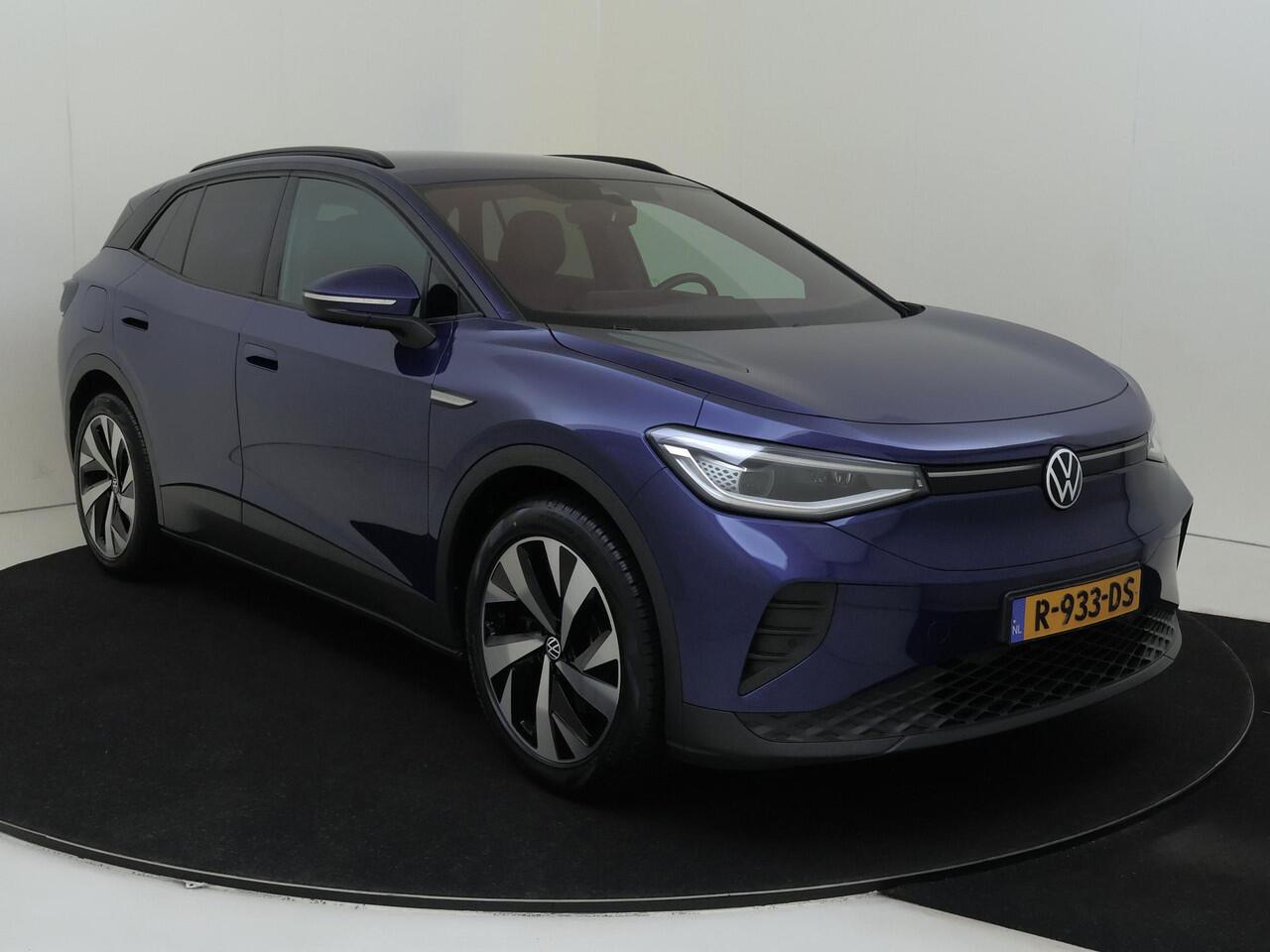 Volkswagen ID.4 Pure 52 kWh | SoH 91% | Trekhaak | Keyless | Achteruitrijcamera | Parkeersensoren | 3-zone airco | Stoel- en stuurwielverwarming | Adaptieve cruise control | CarPlay |