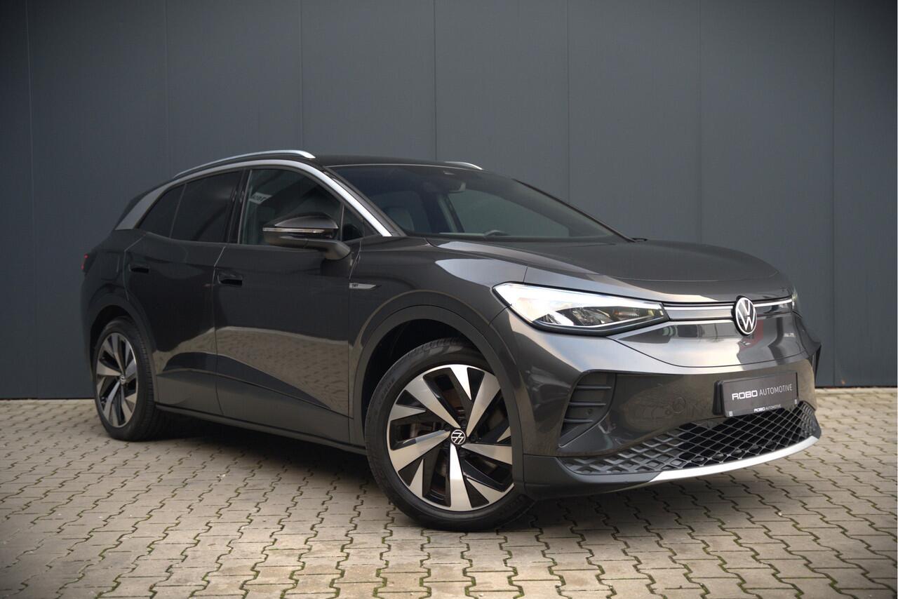 Volkswagen ID.4 First 77 kWh | Stoelverwarming | Stuurverwarming | Trekhaak | Warmtepomp | Adaptive Cruise Control | Navigatie | Apple Carplay | Keyless | Camera | Parkersensoren |