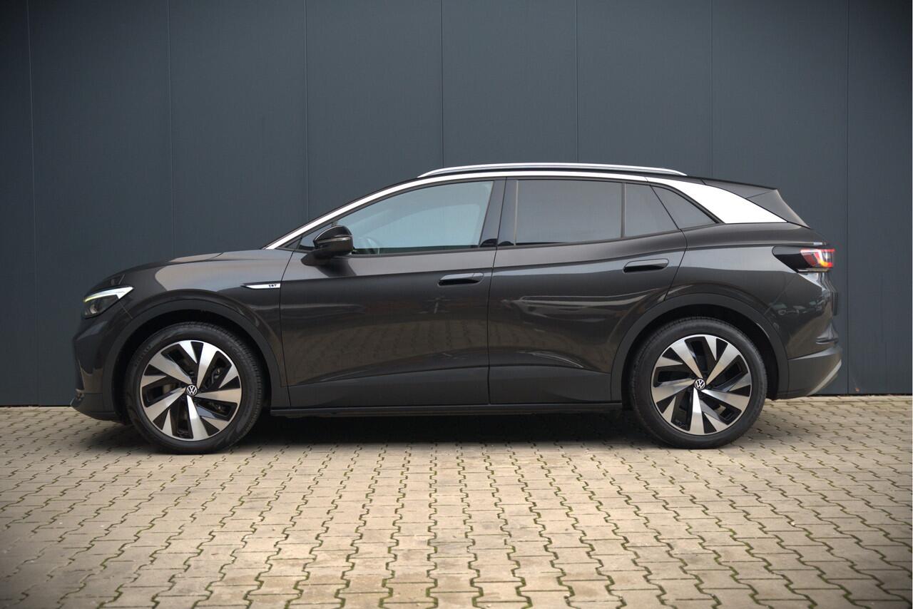 Volkswagen ID.4 First 77 kWh | Stoelverwarming | Stuurverwarming | Trekhaak | Warmtepomp | Adaptive Cruise Control | Navigatie | Apple Carplay | Keyless | Camera | Parkersensoren |