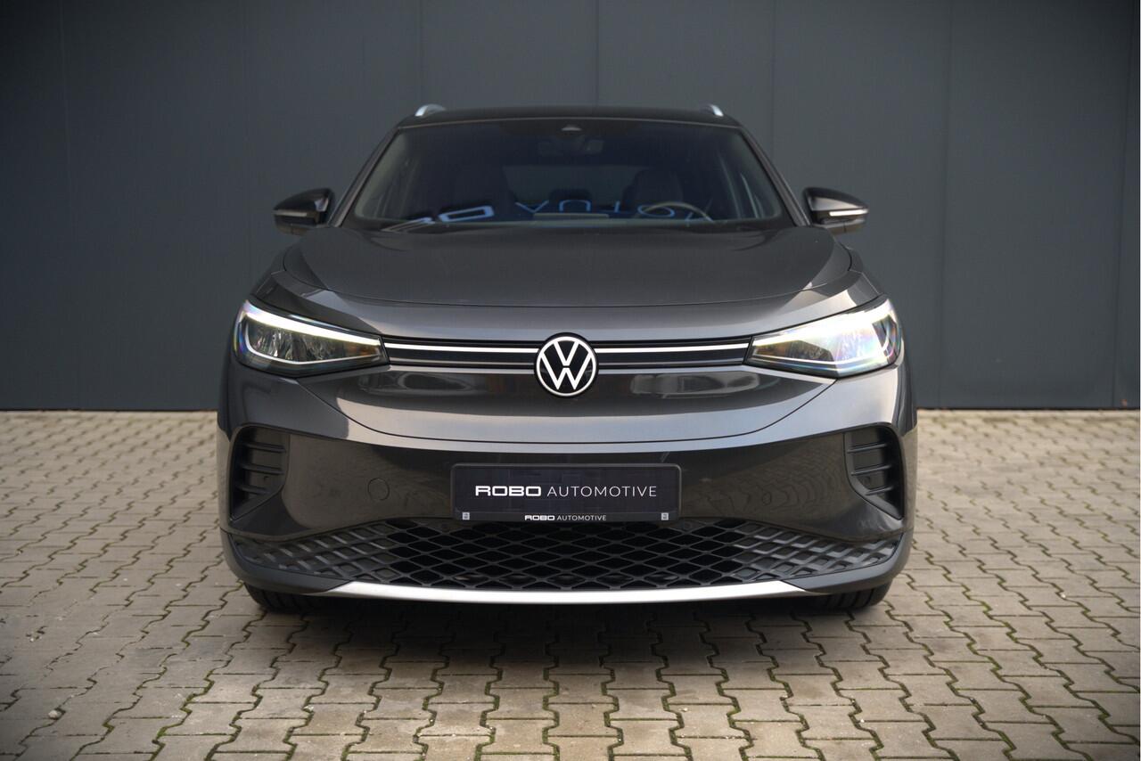 Volkswagen ID.4 First 77 kWh | Stoelverwarming | Stuurverwarming | Trekhaak | Warmtepomp | Adaptive Cruise Control | Navigatie | Apple Carplay | Keyless | Camera | Parkersensoren |
