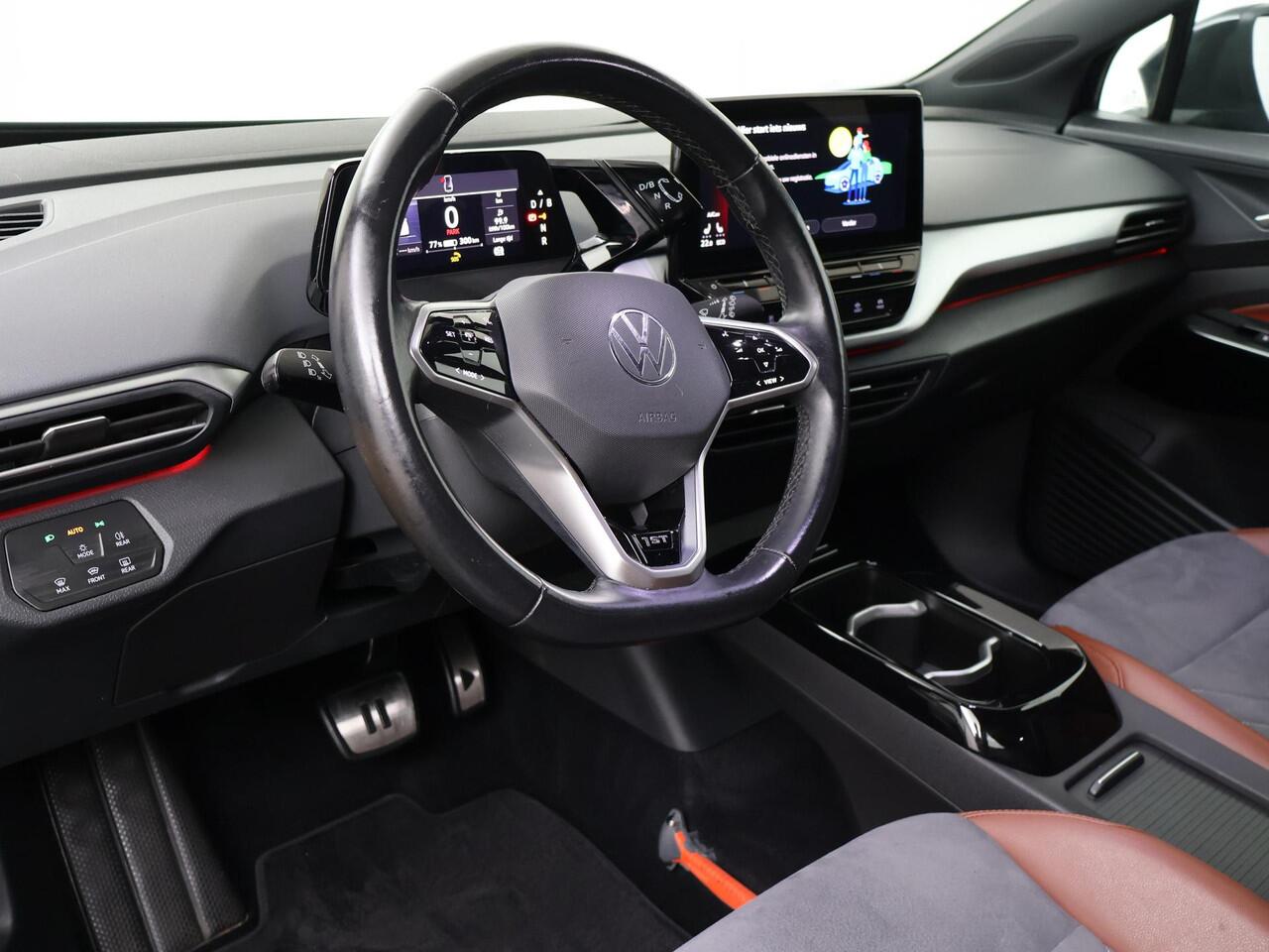 Volkswagen ID.4 First 77 kWh | 204 PK | SoH 87% | Navigatiesysteem | Adaptive cruise control | Verwarmde voorstoelen + voorruit | 20" LM velgen |