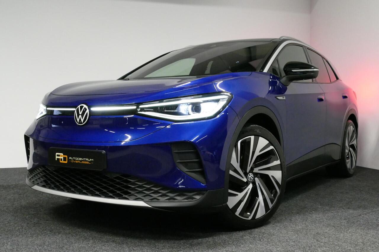Volkswagen ID.4 First Max 77 kWh / SOH 92% / Panoramadak / Matrix LED IQ.Light / Elektr. verstelbare voorstoelen + memory / HUD Augmented Reality / Rondomzichtcamera / Apple Carplay - Android Auto / Stoelverwarming / 21'' LMV / Keyless / Achteruitrijcamera / Navigatie / 