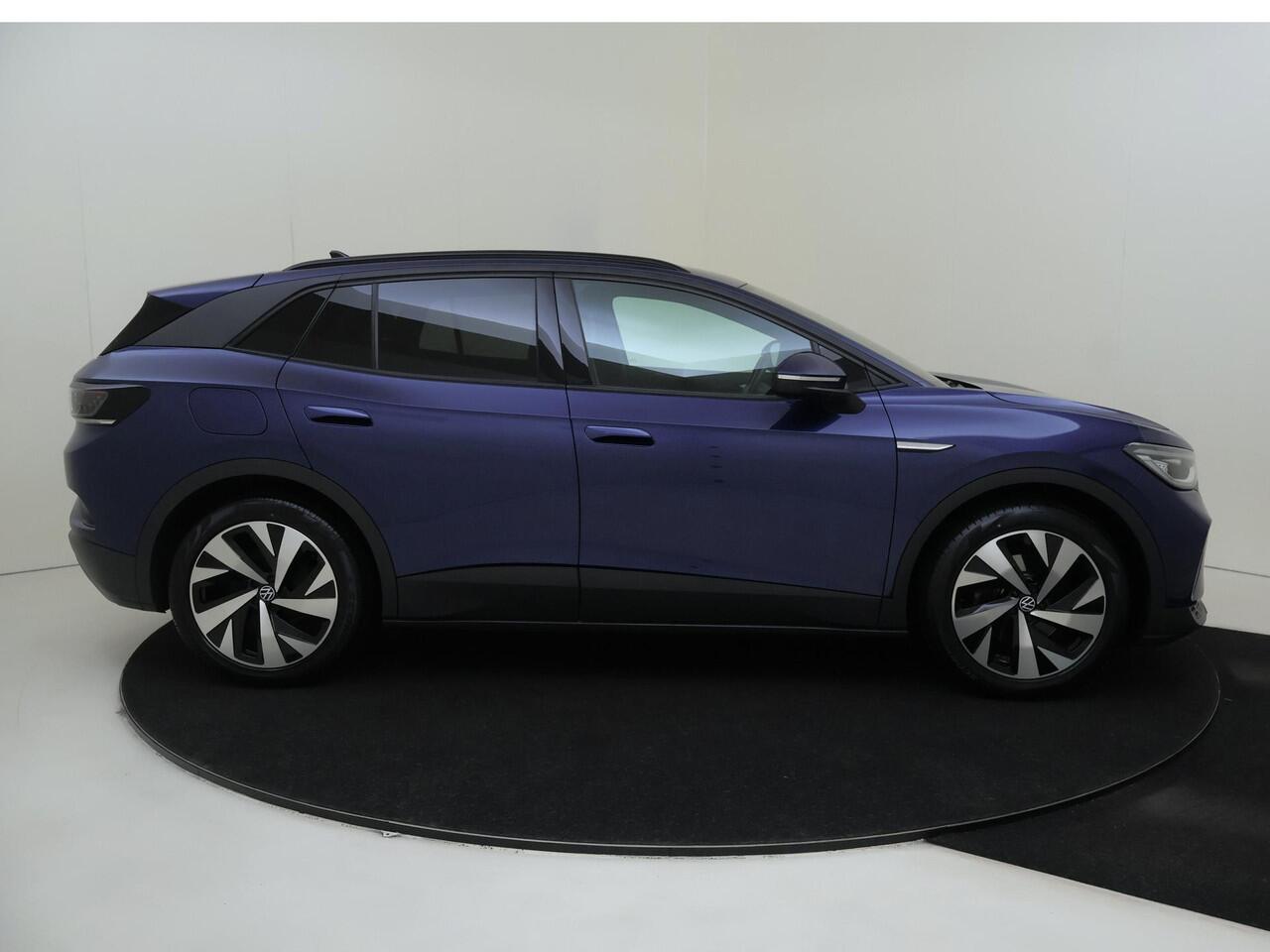 Volkswagen ID.4 Pure 52 kWh | Trekhaak | Keyless | Achteruitrijcamera | Parkeersensoren | 3-zone airco | Stoel- en stuurwielverwarming | Adaptieve cruise control | CarPlay |