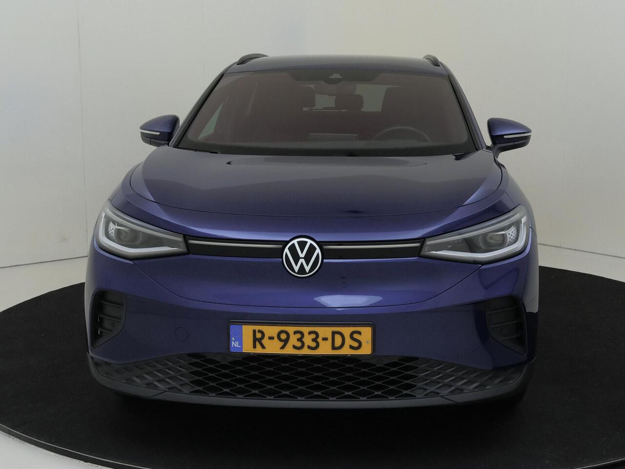 Volkswagen ID.4 Pure 52 kWh | Trekhaak | Keyless | Achteruitrijcamera | Parkeersensoren | 3-zone airco | Stoel- en stuurwielverwarming | Adaptieve cruise control | CarPlay |