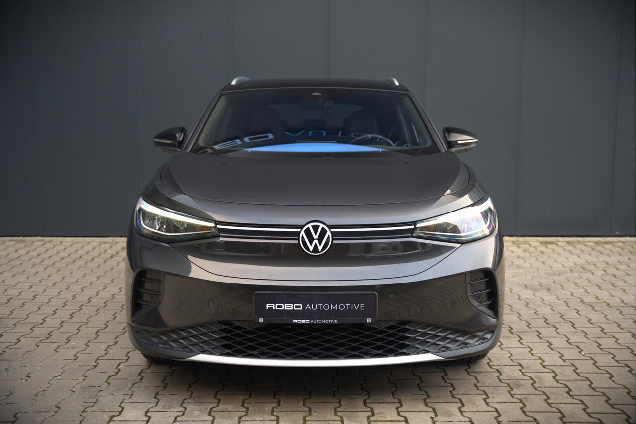 Volkswagen ID.4 First 77 kWh | Stoelverwarming | Stuurverwarming | Trekhaak | Warmtepomp | Adaptive Cruise Control | Navigatie | Apple Carplay | Keyless | Camera | Parkersensoren |