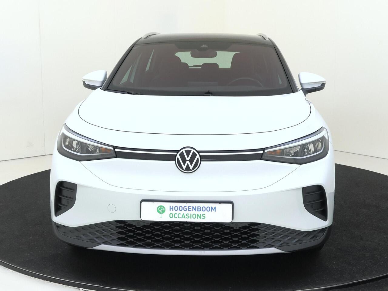 Volkswagen ID.4 Pro 77 kWh | Stoelverwarming | Adaptieve cruise control | Navigatie | Voorklimatisering | Parkeersensoren | CarPlay | Sfeerverlichting |