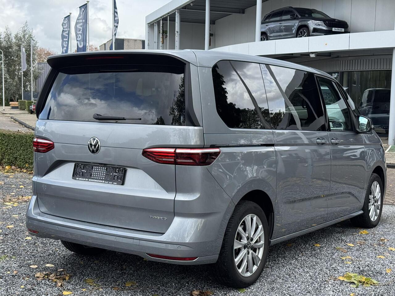 Volkswagen MULTIVAN T7 eHybrid DSG Bulli 7p (Pano,Trekhaak,Camera,Elek. schuifd)