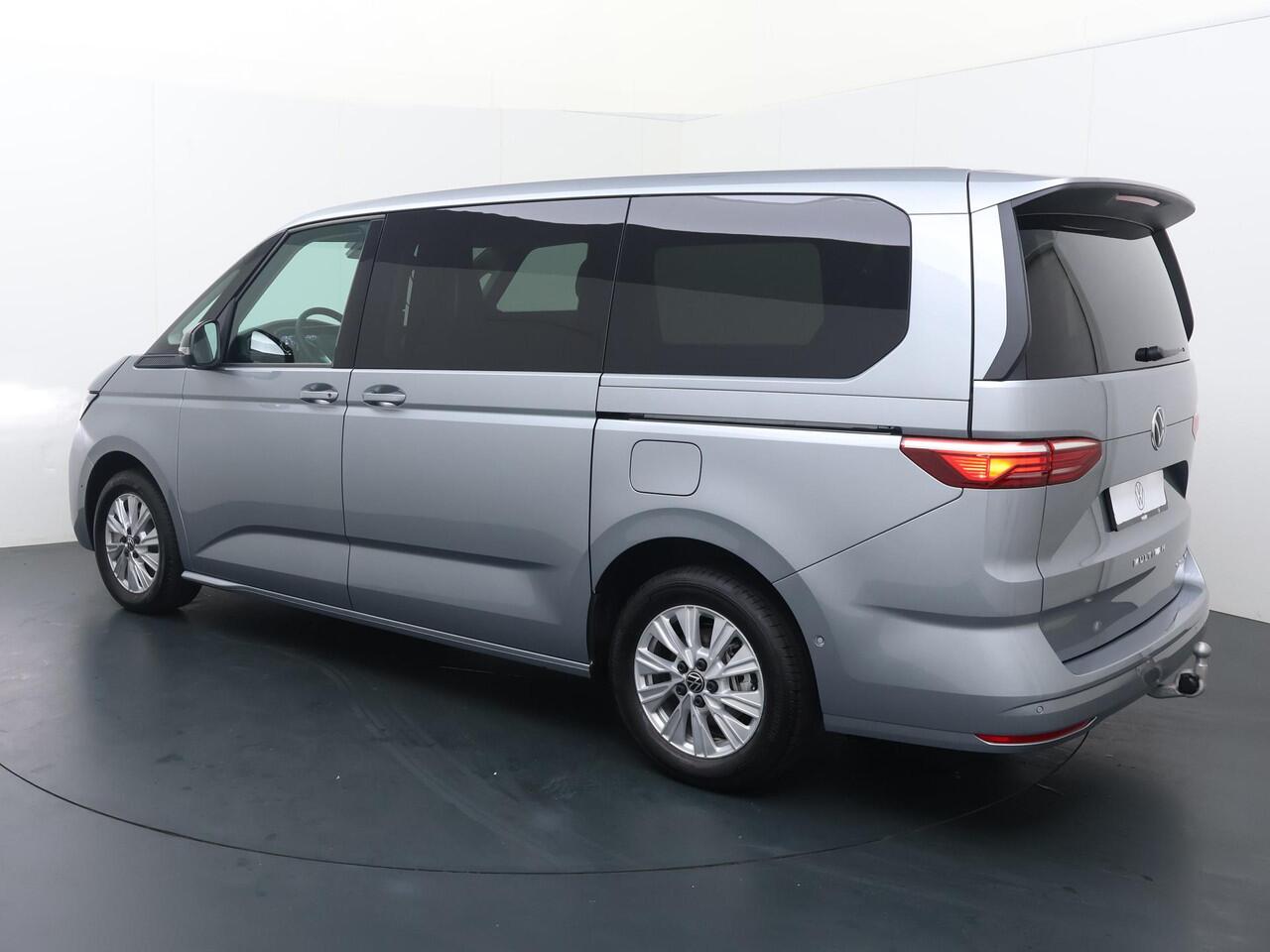 Volkswagen MULTIVAN Bedrijfswagens Economy Business L2 1.5 eHybrid EU6 180 kW (245pk) | Bestelwagen toegestaan voor ALLE ZERO Emissie Milieu-zones M1-Kenteken | Schot laadruimte achter voorstoelen | Houten Laadvloer | Prijs excl. BTW