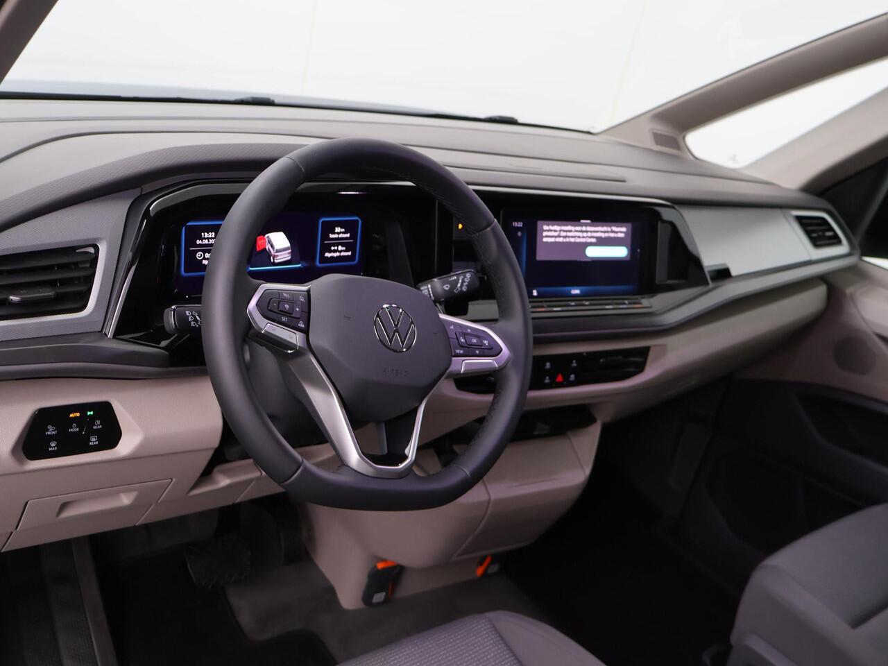 Volkswagen MULTIVAN Bedrijfswagens Economy Business L2 1.5 eHybrid EU6 180 kW (245pk) | Bestelwagen toegestaan voor ALLE ZERO Emissie Milieu-zones M1-Kenteken | Schot laadruimte achter voorstoelen | Houten Laadvloer | Prijs excl. BTW