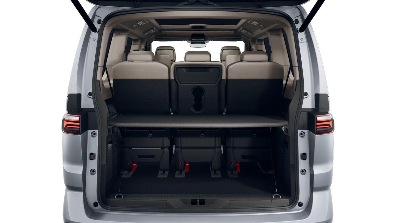 Volkswagen MULTIVAN Bedrijfswagens Bulli L2 1.5 Ehybrid 180kW 245 pk DSG 4 motion | Easy Open Paket Basis | Multifunctionele verschuifbare tafel in passagiersruimte | Navigatiesysteem '' Discover Pro'' | Privacy Plus glas (90%) vanaf B-stijl |