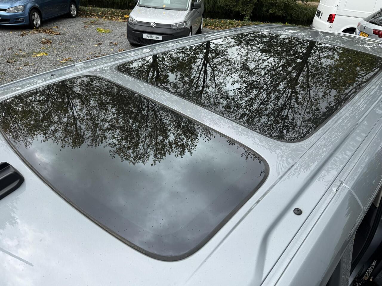 Volkswagen MULTIVAN T7 eHybrid DSG Bulli 7p (Pano,Trekhaak,Camera,Elek. schuifd)