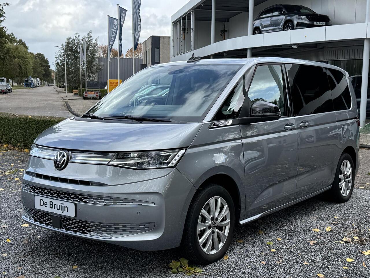 Volkswagen MULTIVAN T7 eHybrid DSG Bulli 7p (Pano,Trekhaak,Camera,Elek. schuifd)