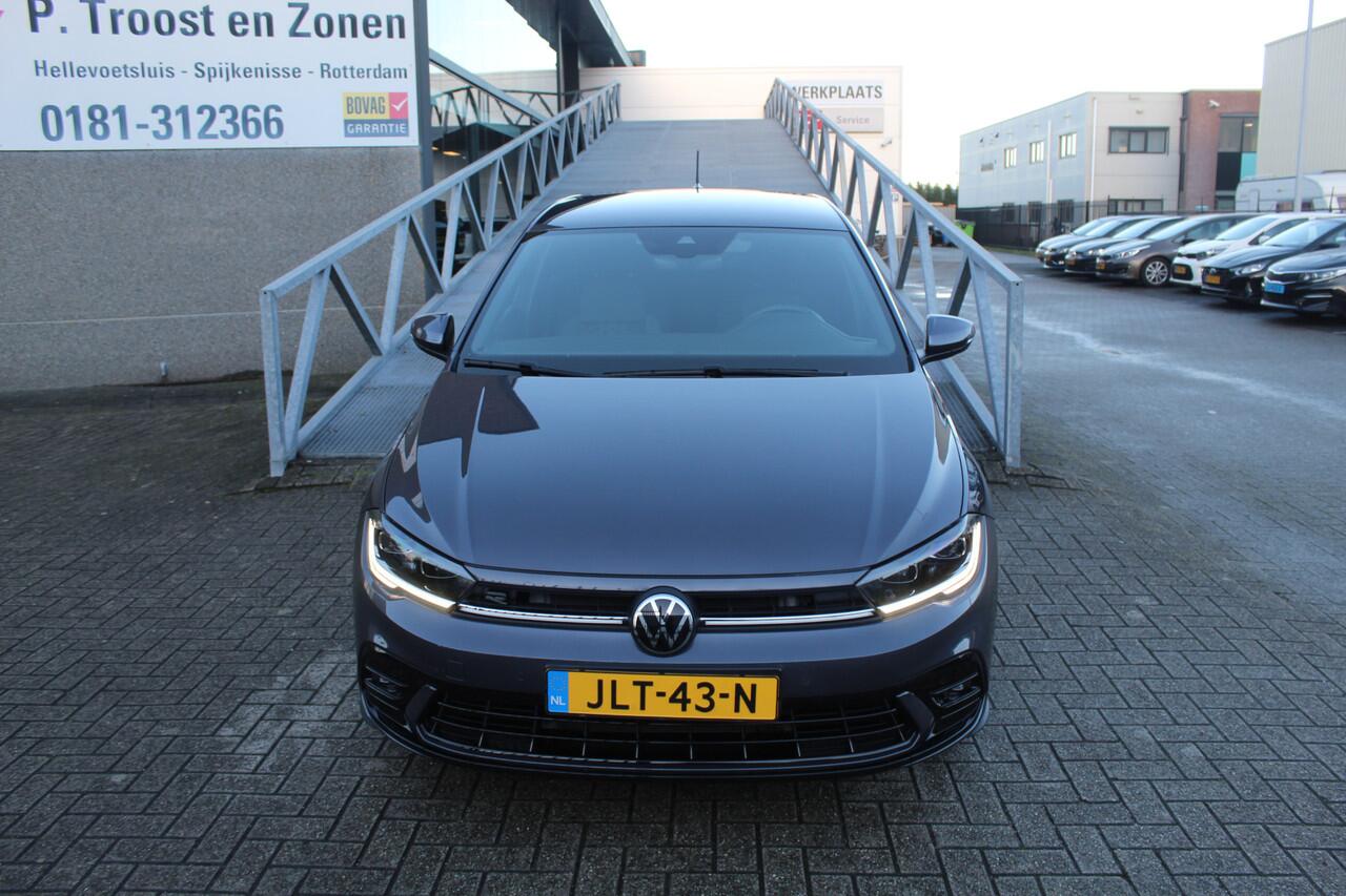 Volkswagen POLO 1.0 TSI 2x R-Line Automaat Navigatie/Virtual cockpit/Adaptive cruise control/Achteruitrijcamera/Parkeersensoren rondom/Apple carplay/Stoelverwarming/LED grill/IQ.light/Climate control/Draadloze telefoonlader/DAB/17''Lichtmetalen velgen.