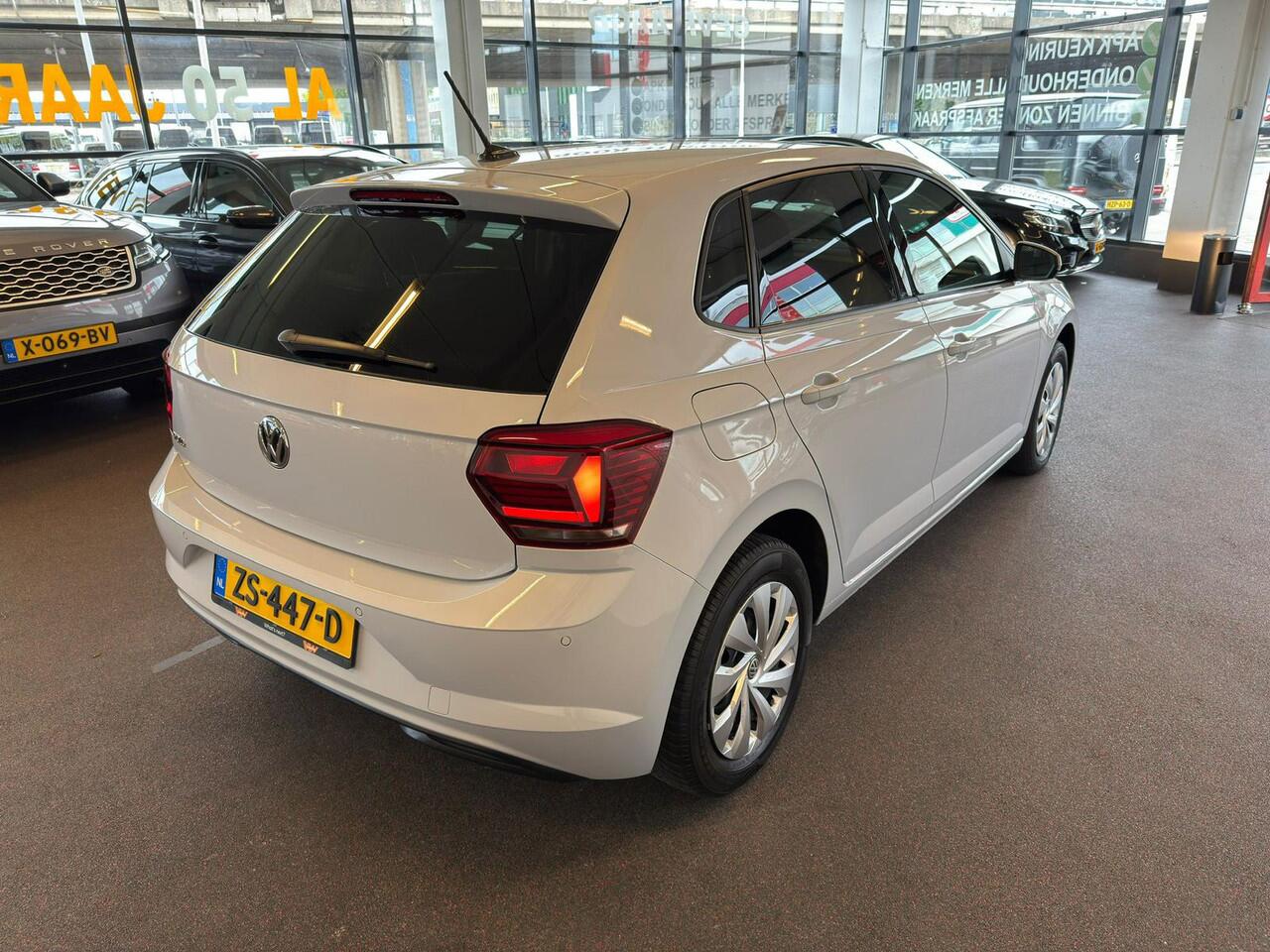 Volkswagen POLO 1.0 TSI Highline Orig.NL auto/Metallic wit/Navigatie/Apple car play/Climate control/Adaptive cruise control/Parkassist/Privacy glass/Spiegel verwarming