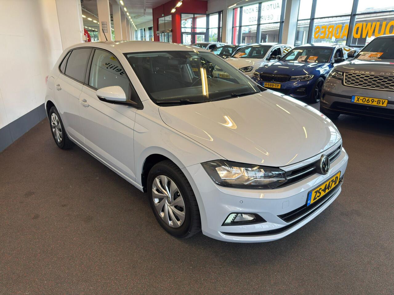 Volkswagen POLO 1.0 TSI Highline Orig.NL auto/Metallic wit/Navigatie/Apple car play/Climate control/Adaptive cruise control/Parkassist/Privacy glass/Spiegel verwarming