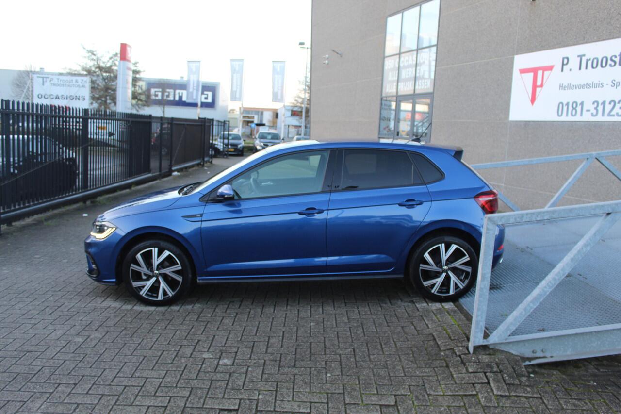 Volkswagen POLO 1.0 TSI 2x R-Line Automaat Navigatie/Virtual cockpit/Adaptive cruise control/Achteruitrijcamera/Parkeersensoren rondom/Apple carplay/Stoelverwarming/LED grill/IQ.light/Climate control/Draadloze telefoonlader/DAB/17''Lichtmetalen velgen.