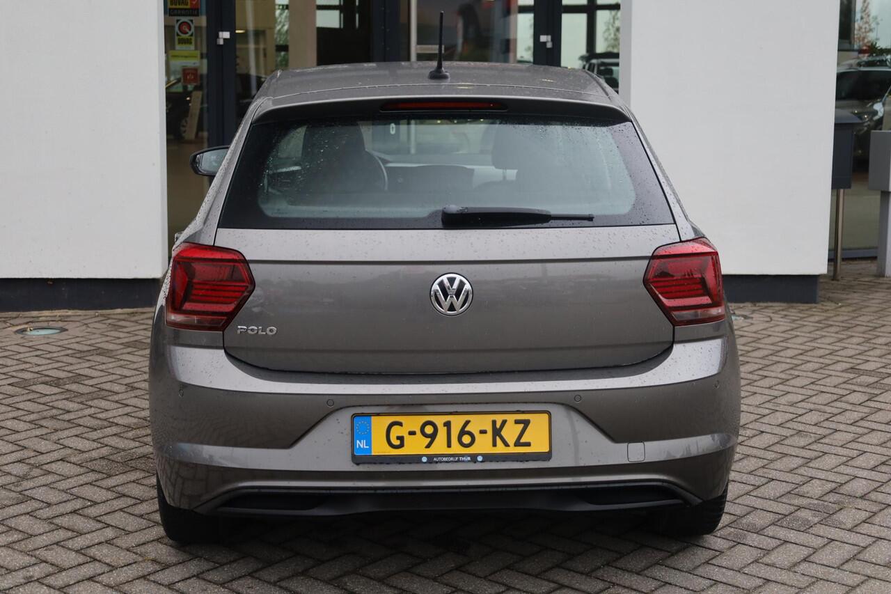 Volkswagen POLO 1.0 TSI Comfortline digital cockpit 15" LMV pdc voor en achter navigatie acc armsteun NL auto 1e eigenaar nieuw door ons geleverd en onderhouden
