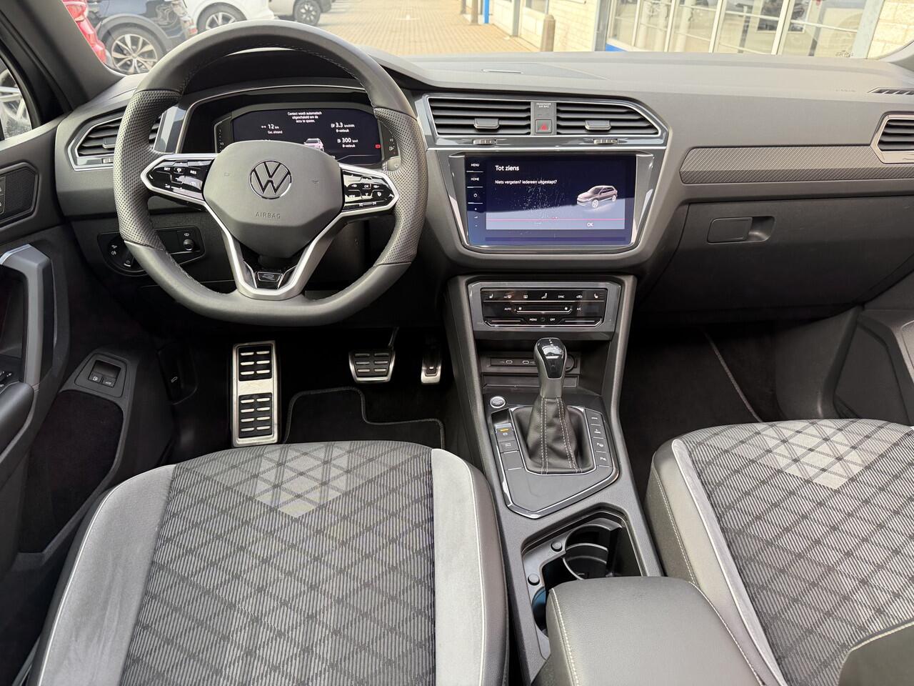 Volkswagen TIGUAN 1.4 TSI eHybrid R-Line / AUTOMAAT/ PANO/ PARK.SENSOR.V+A/ CAMERA/ STUUR+STOEL VERWARM./ KEYLESS/ ACC/ DODE HOEK/ ELEK.KLEP/ APP-CONNECT/ NAVI/ CLIMA/ DAB/ IQ.LIGHT/ DIGITAL DASH/ ISOFIX/ 19'' LMV