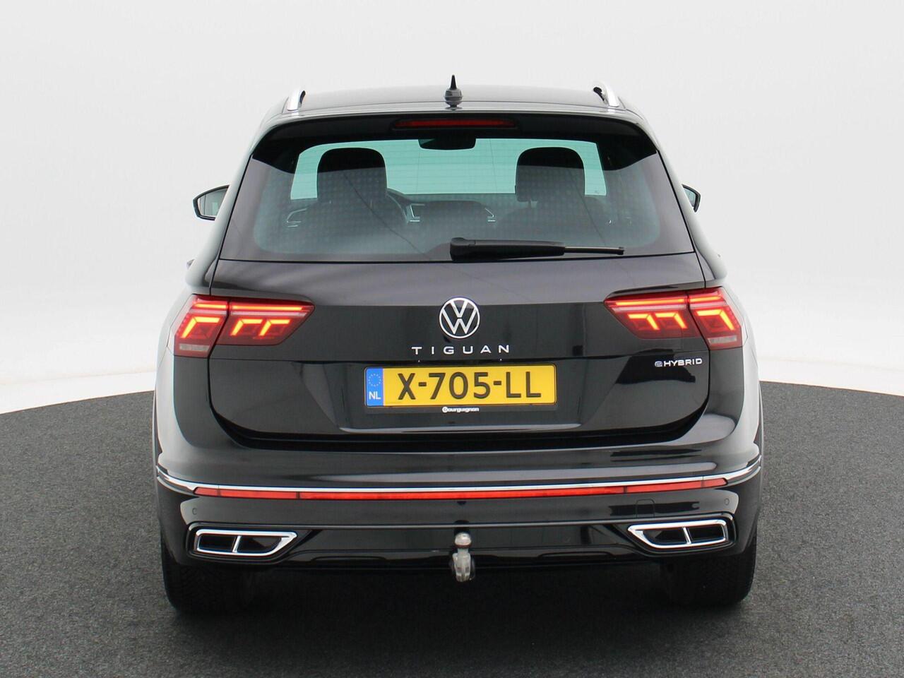 Volkswagen TIGUAN 1.4 TSi 145 Pk eHybrid R-Line Business Automaat | Trekhaak | LED | Stoel en Stuur Verwarming | Adaptive Cruise | Carplay | Navigatiesysteem | Parkeersensoren | Camera | Elektrische Achterklep | 20 Inch | 30.380 Km!!