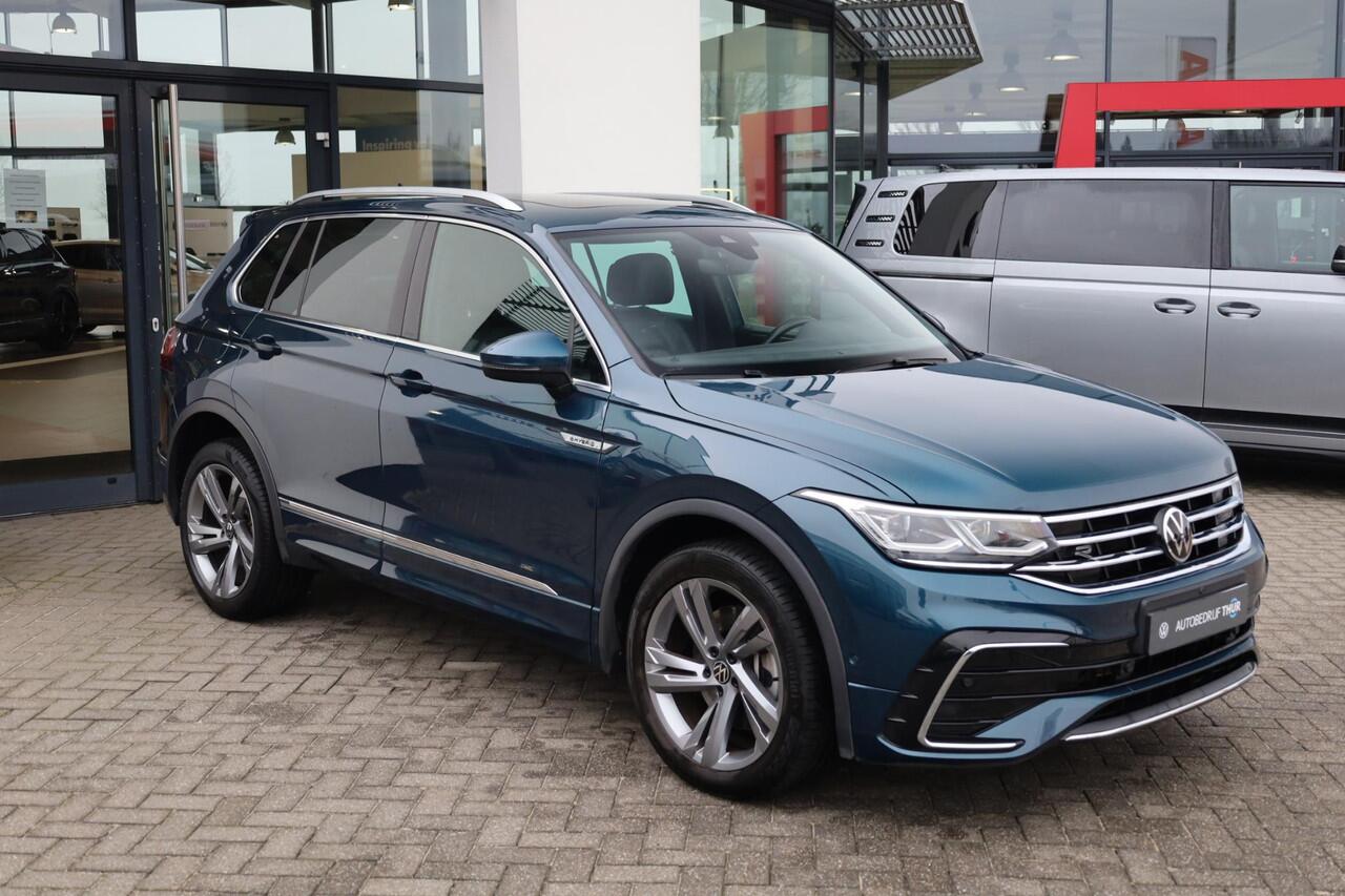 Volkswagen TIGUAN 1.4 TSI eHybrid R-Line Business+ PL ¤720 p/m* 150PK / 110kW panoramadak Lederenbekleding + elektrische stoelverstelling met geheugen stoelverwarming area view rondom zicht camera stuurwiel verwarming IQ matrix easy open & close park assist acc side assist