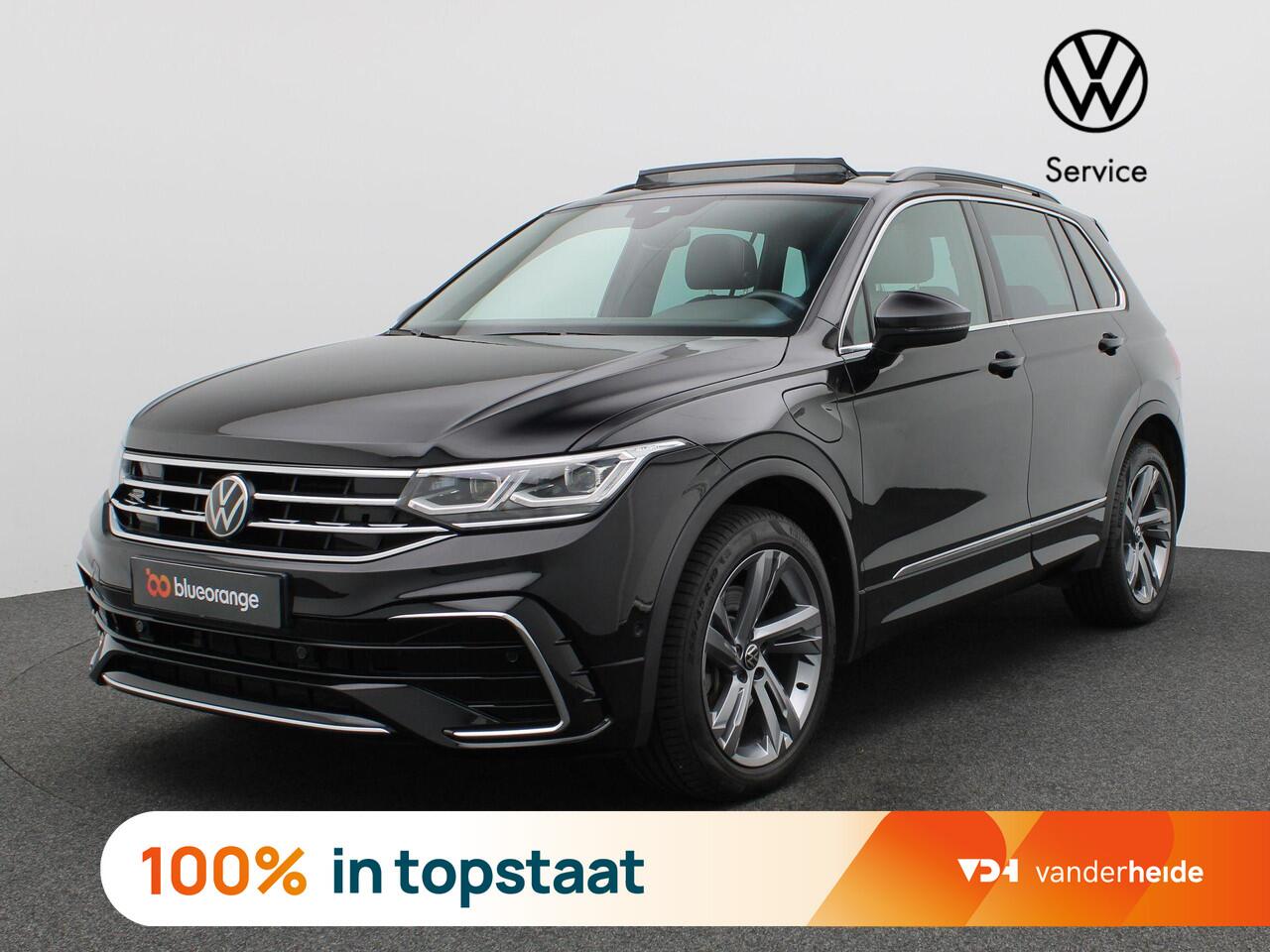 Volkswagen TIGUAN 1.4 TSI eHybrid R-Line Business 245PK DSG Panorama Dak, Trekhaak, Achterruitrijamera, Elektr. Achterklep, Virtual Cockpit, Matrix-LED Verlichting, Adaptieve Cruise Control, Side Assist, Stuur- en Stoelverwarming, Park Assist, 19" LM Velgen