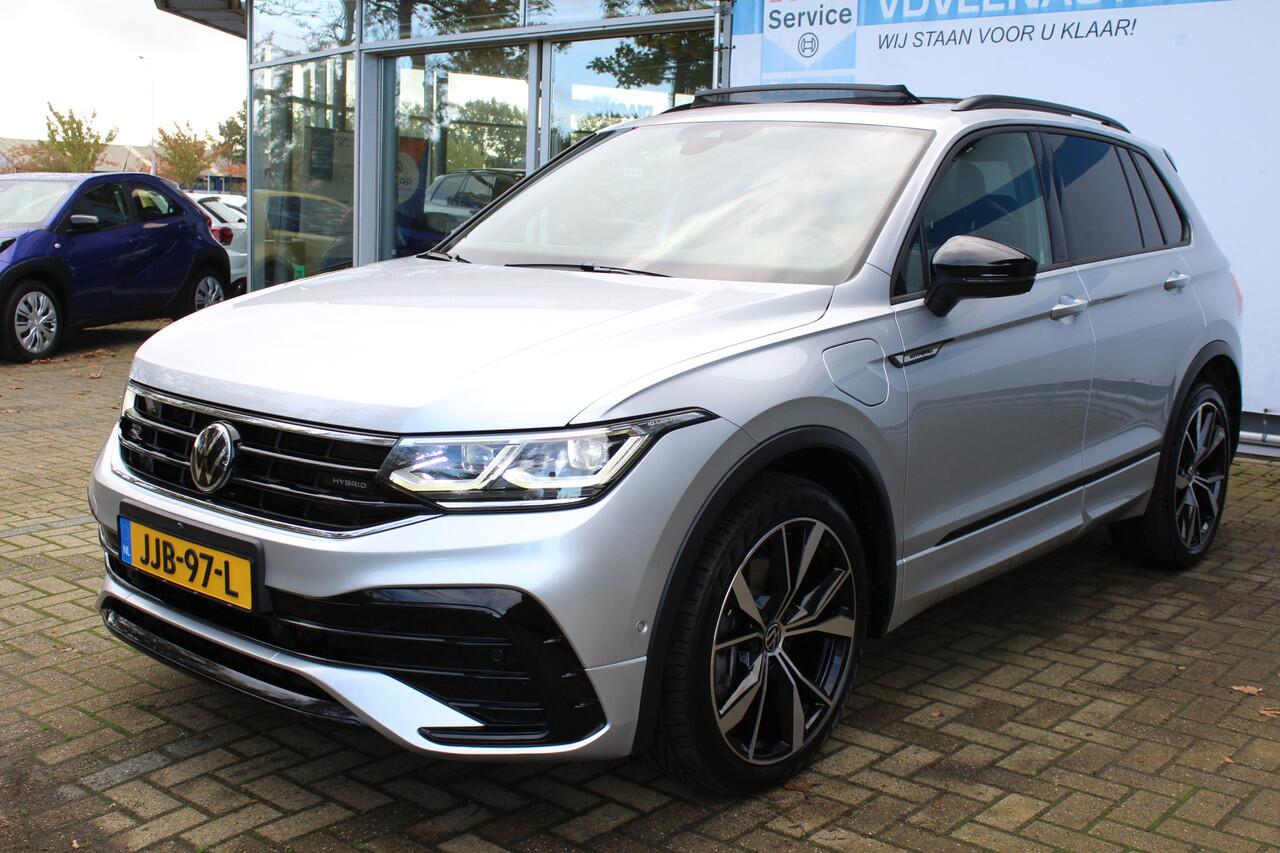Volkswagen TIGUAN 1.4 TSI eHybrid R-Line Business 245 pk | Incl. 12 maanden Garantie | Panorama dak | Stoel/stuurverwarming | 360* Camera | Elektrisch verstelbare stoelen met memory | Achterbank verwarmd | Keyless enry/start | Adaptieve cruise | Lane assist | IQ.Lights | D