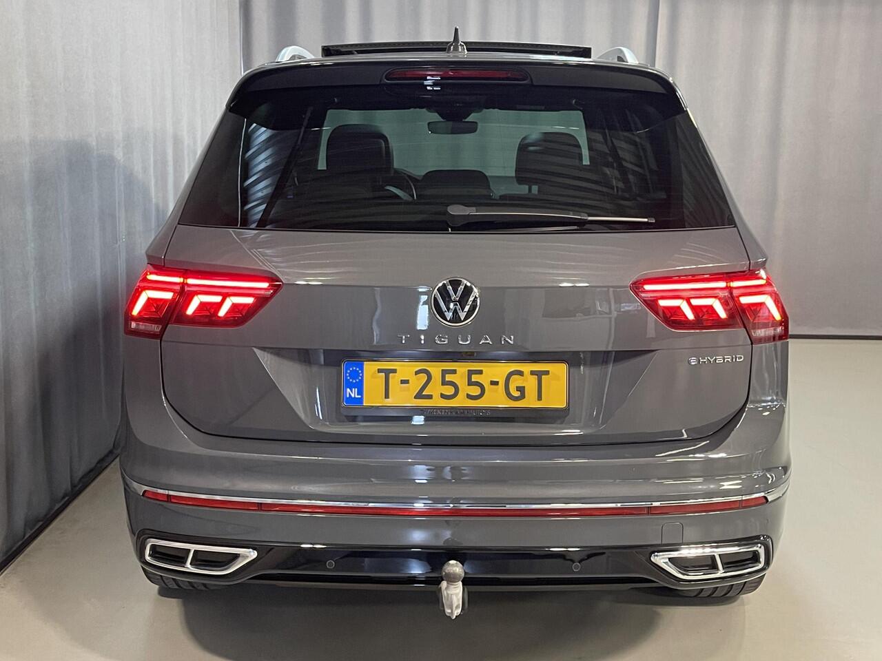 Volkswagen TIGUAN 1.4 TSI eHybrid R-Line Business+ 20"/Panoramadak/Trekhaak/Leder + memory/Elektrische klep/Dodehoek/Stuur + stoelverwarming/IQ Lights/Adaptieve cruise