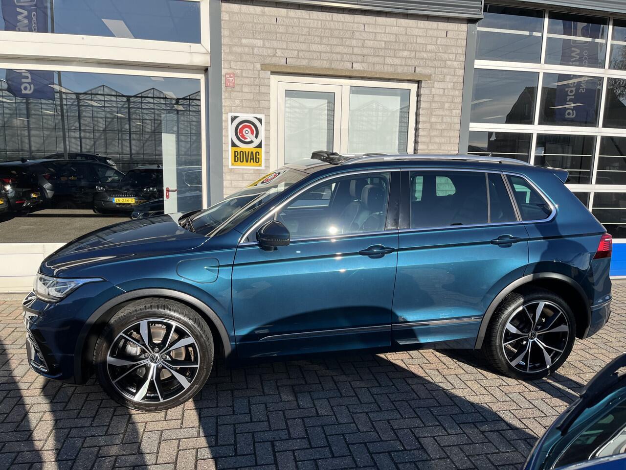 Volkswagen TIGUAN 1.4 TSI eHybrid R-Line Business+ / AUTOMAAT/ 2X R-LINE/ 245 PK/ TREKHAAK/ PANO/ DAB/ CAMERA/ PARK. SENSOREN/ LED/ STUUR+STOEL VERWARM./ ACC/ DCC/ ELEK.KLEP/ APP-CONNECT/ KEYLESS/ NAVI/ CLIMA/ ISOFIX/ 20" LMV