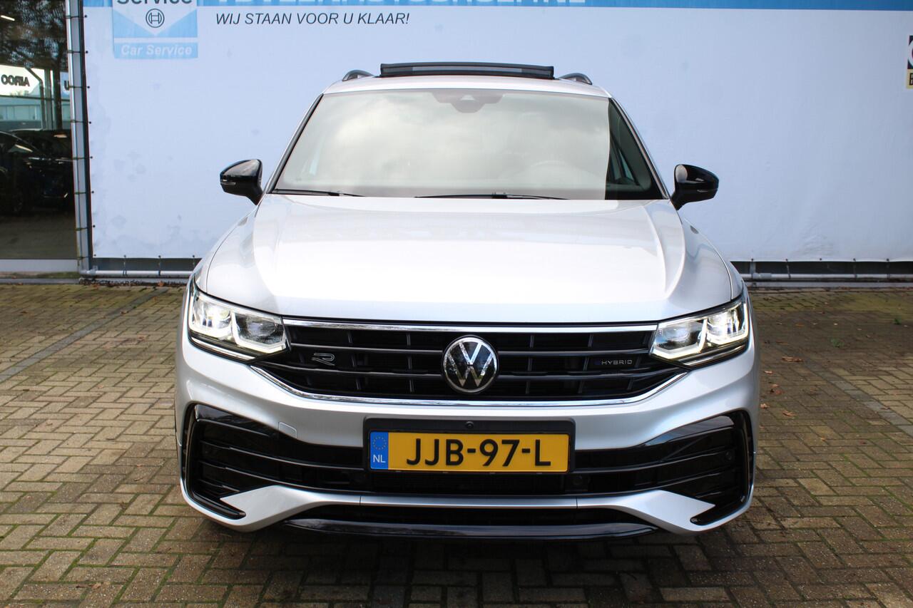 Volkswagen TIGUAN 1.4 TSI eHybrid R-Line Business 245 pk | Incl. 12 maanden Garantie | Panorama dak | Stoel/stuurverwarming | 360* Camera | Elektrisch verstelbare stoelen met memory | Achterbank verwarmd | Keyless enry/start | Adaptieve cruise | Lane assist | IQ.Lights | D