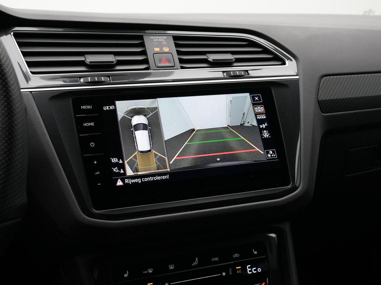 Volkswagen TIGUAN 1.4 TSI eHybrid 245 pk DSG R-Line | Panoramadak | Trekhaak | Navigatie Discover Pro | Leder | Geheugenstoelen | Adaptief onderstel | 360 camera | IQ Light